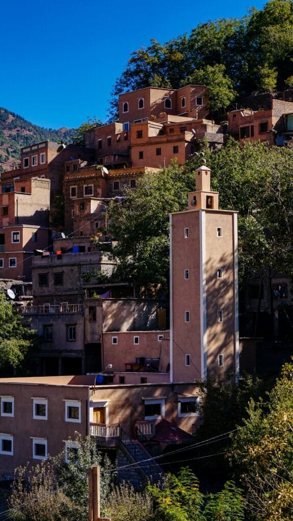 Red earth village on a hillside in the High Atlas mountains near Marrakech