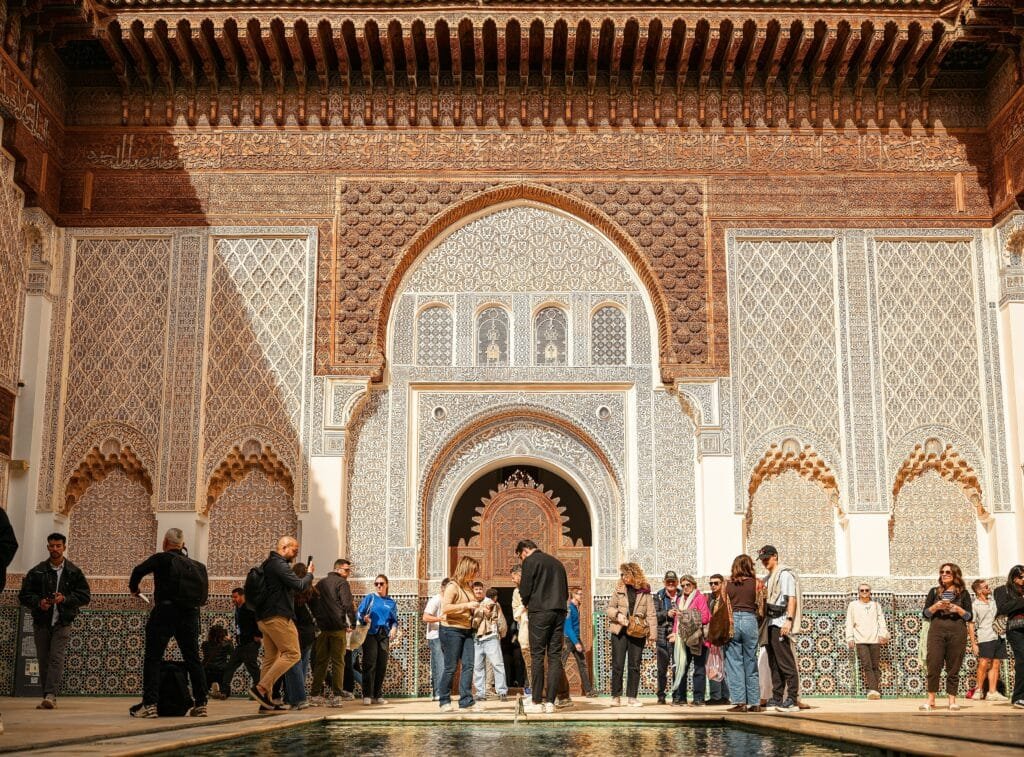 Carved stucco courtyard and reflecting pool of Ben Youssef Madrasa, Marrakech